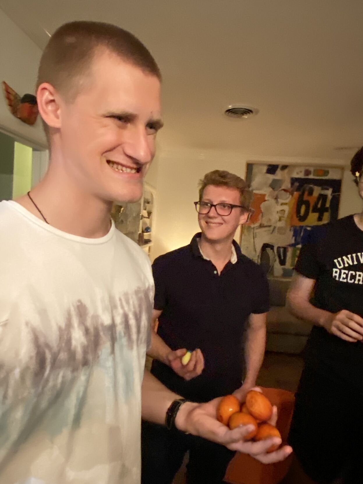 Nick Koval holds a handful of Easter eggs